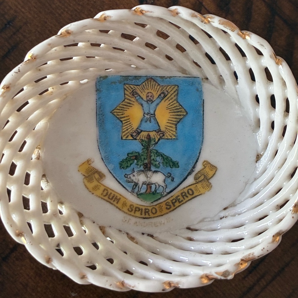 Vintage British crested ware lattice with a coat of arms.